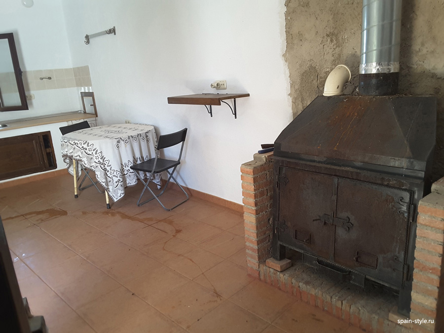 Kitchen and fireplace,  Country house with  7 ha land in the Sierra Nevada National Park